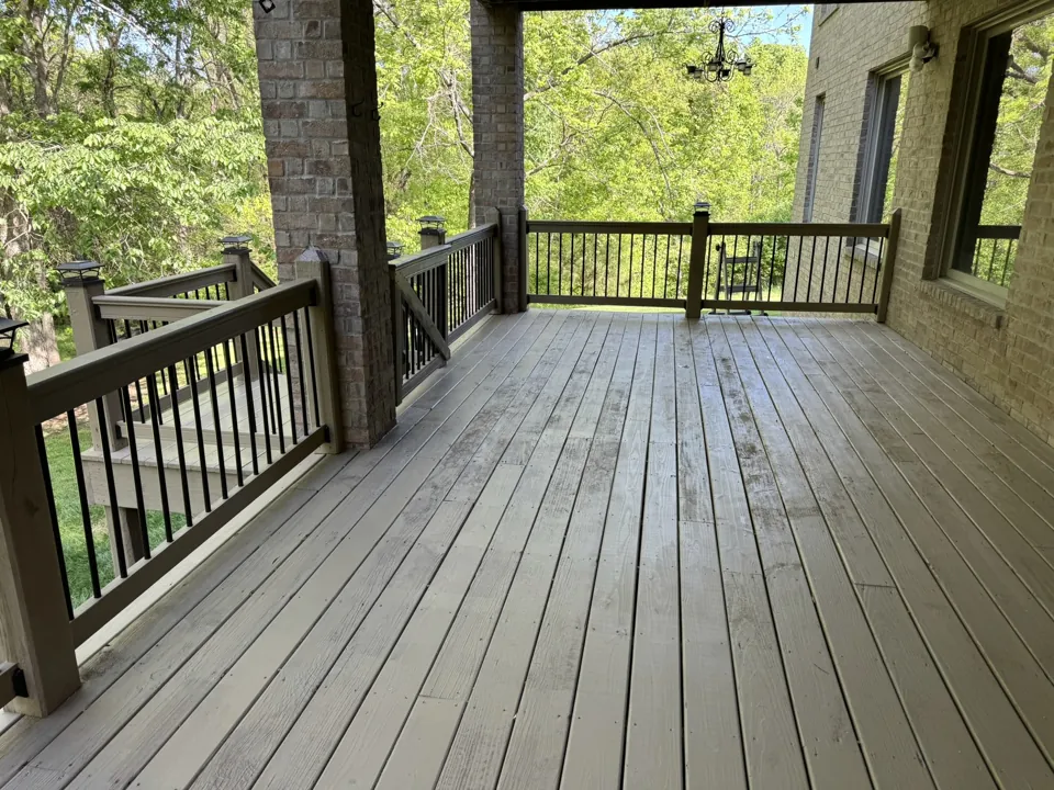 The completed covered deck and its open connection to the yard.