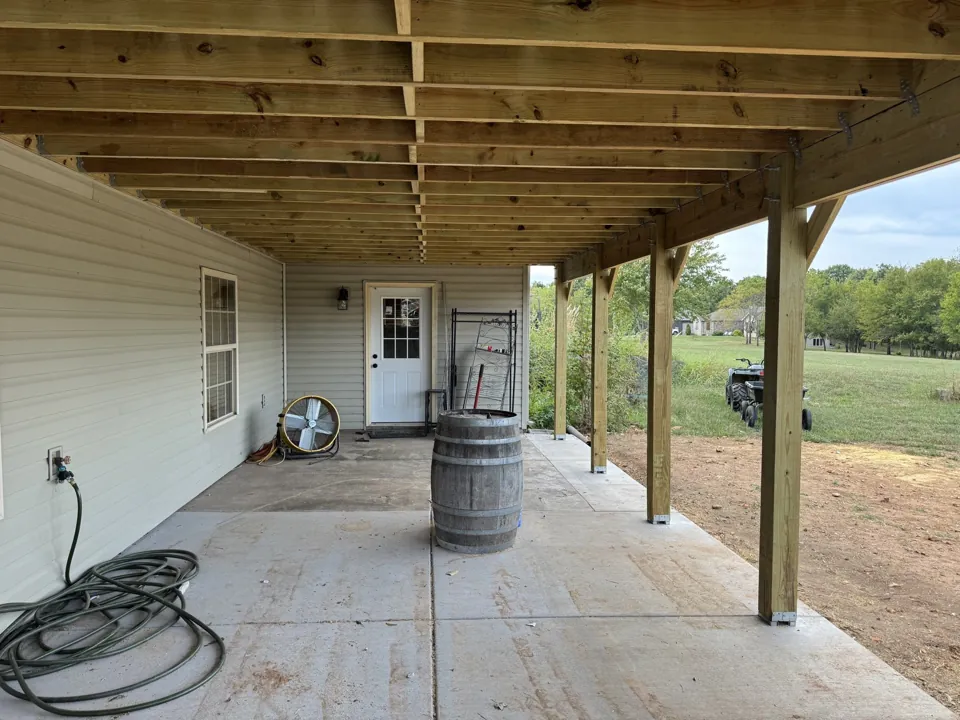 The posts, beams, joists, and connections beneath the deck.