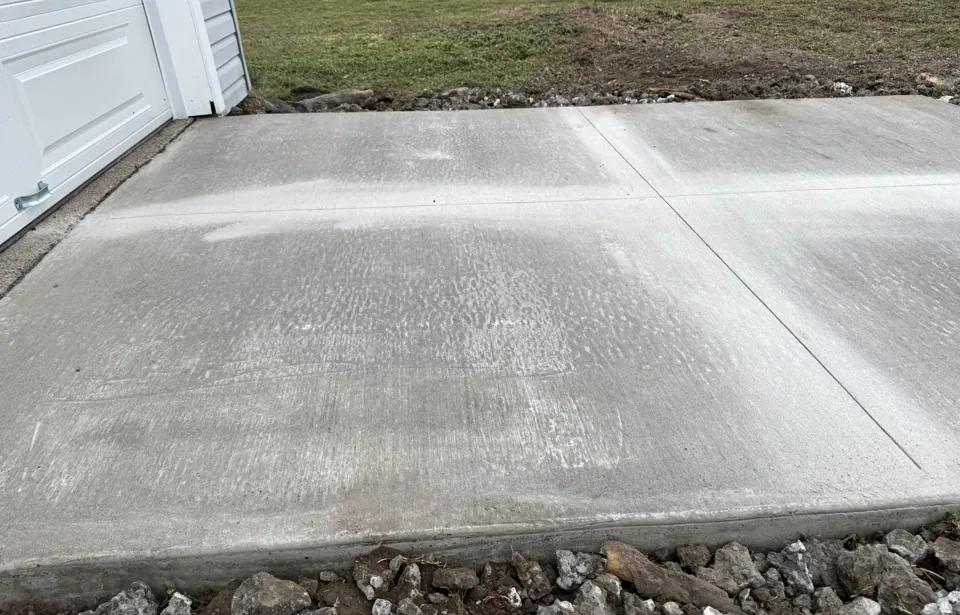 Fresh saw-cut joints in the finished garage apron.